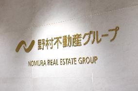 Nomura Real Estate signboard and logo
